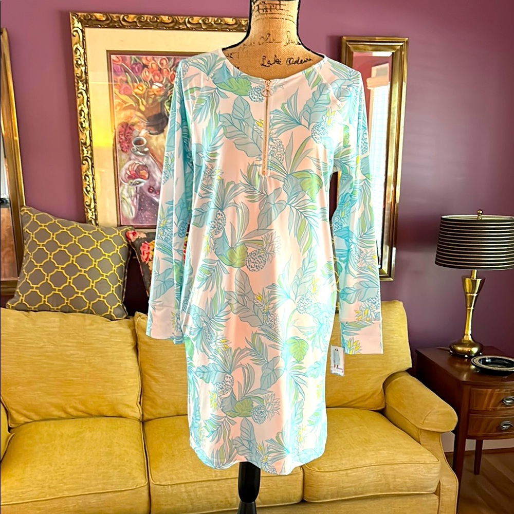 Stella Parker pastel floral golf, swimwear dress, size M.. UPS 30+